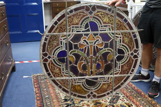 A set of eleven 19th century stained glass roundels, diameter 24in.